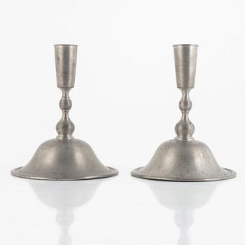 Firma Svenskt Tenn, a pair of pewter candlesticks model "76", Stockholm 1930.