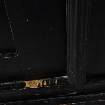 Display cabinet, circa 1900.