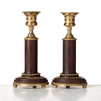 A pair of late Gustavian late 18th century candlesticks.