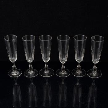 Six champagne flutes, circa 1900.