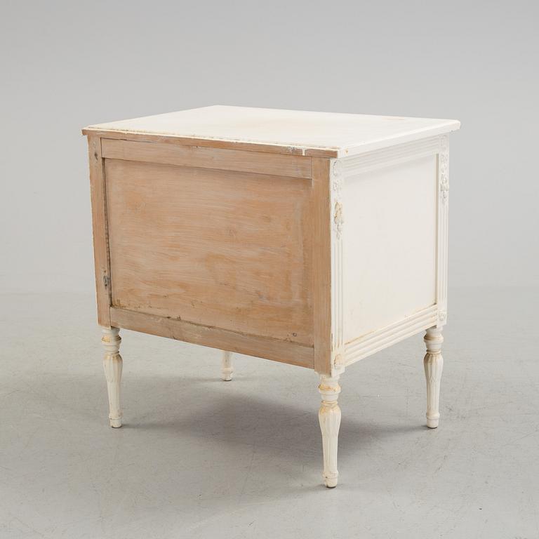 An early 20th century Gustavian style cupboard.