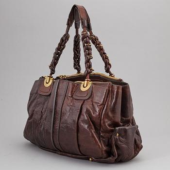 CHLOÉ, a brown leather bag.