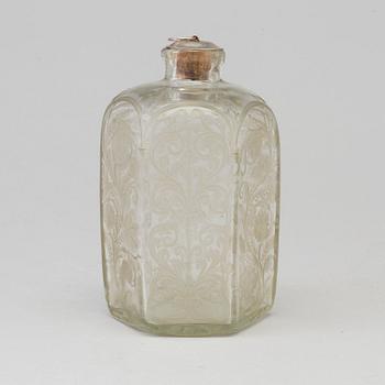 A baroque glass bottle, first half of the 18th century.