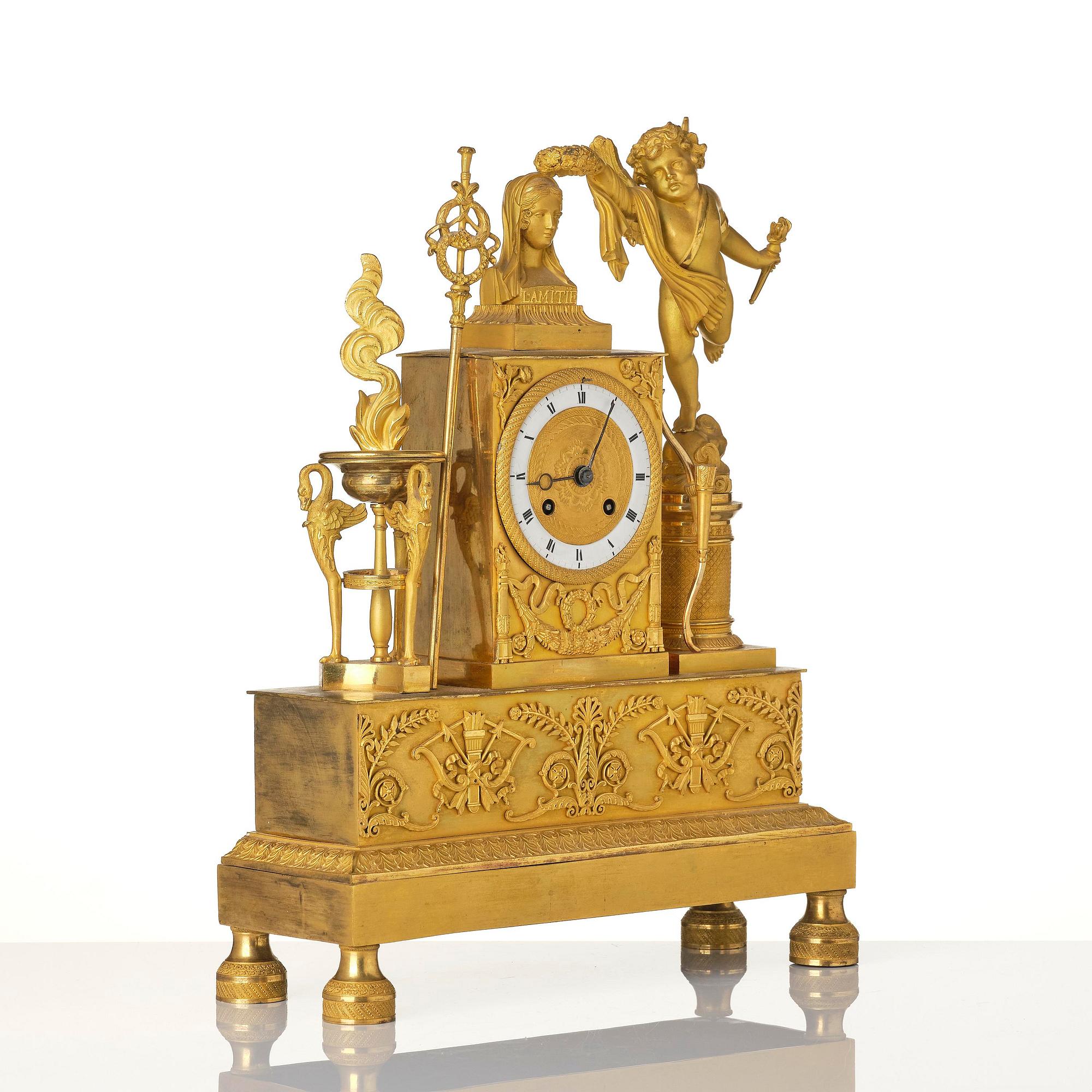 A French Empire ormolu figural mantel clock, early 19th century.