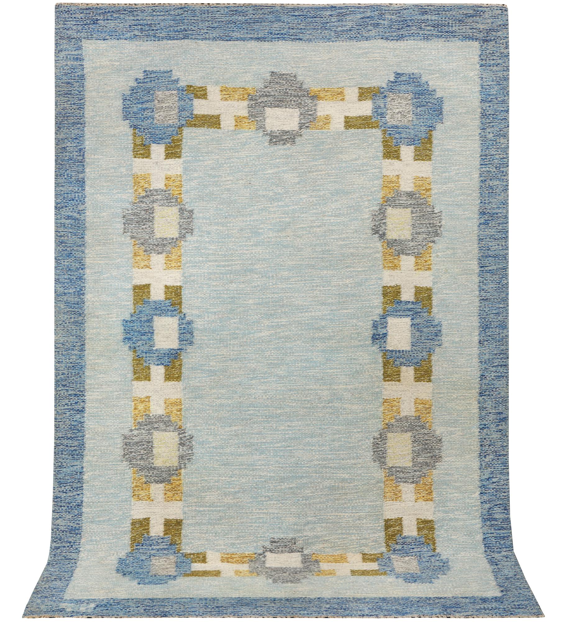 Kerstin Persson, a flat weave carpet, signed KP, c. 240 x 155 cm.
