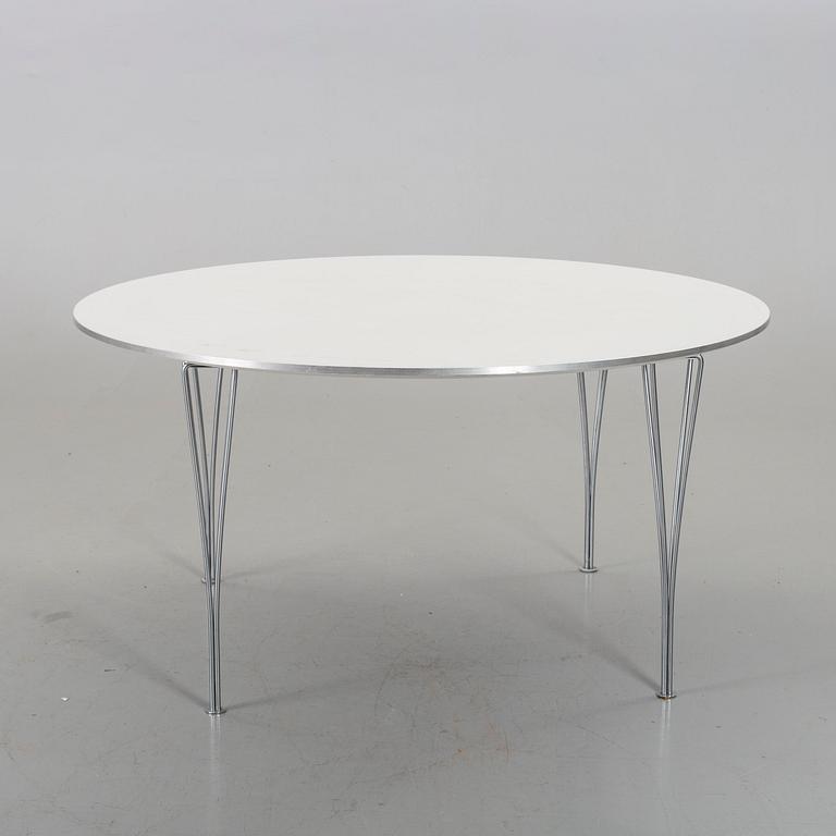 A TABLE BY BRUNO MATHSSON, PIET HEIN & ARNE JACOBSEN FOR FRITZ HANSEN.
