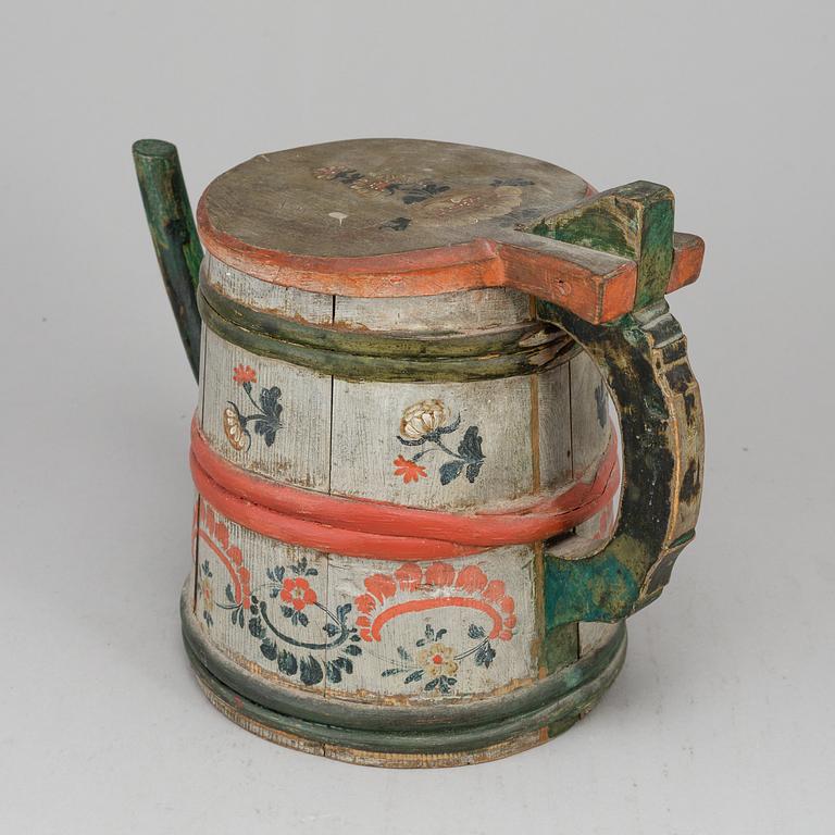 A painted wooden jar from the 19th century.