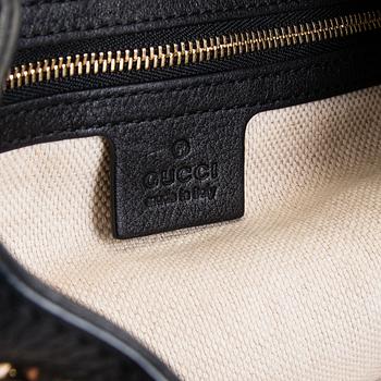 Gucci, a 'Soho' bag.
