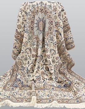 A carpet, Nain part silk s.k 9LAA, ca 355 x 260 cm.