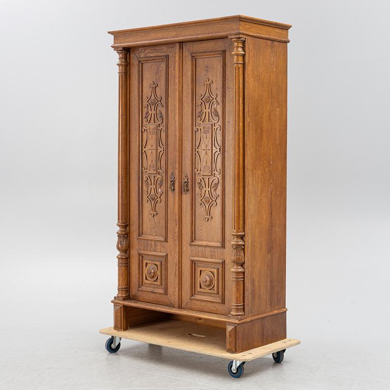 An oak cabinet, late 19th century.