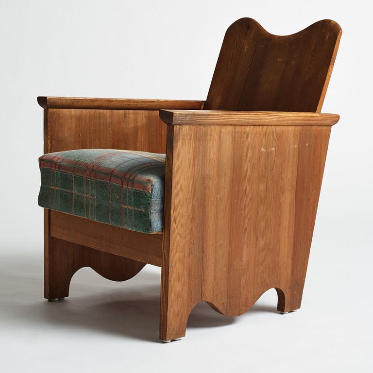 Axel Einar Hjorth, a stained pine easy chair "Utö", Nordiska Kompaniet, Sweden 1930's.
