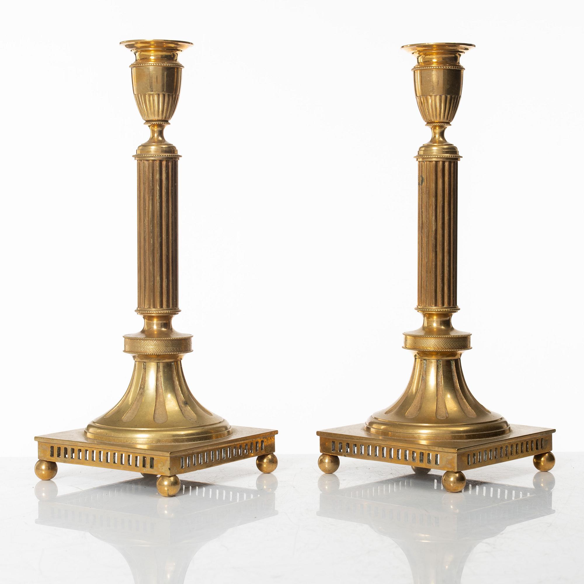 Ljusstakar, ett par, mässing, modell nr 71, Skultuna Messingsbruk, 1900-talets första hälft.