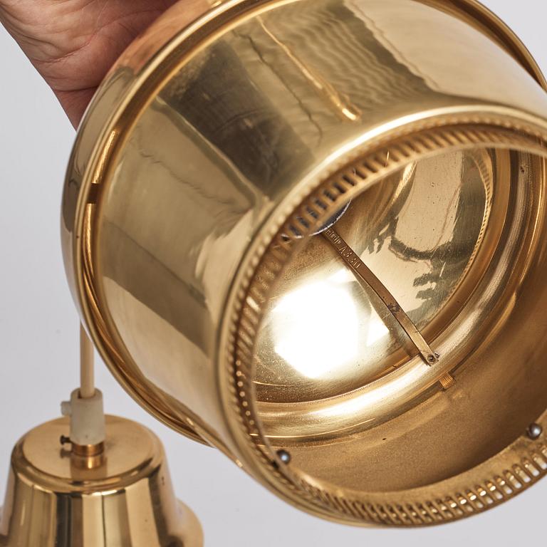 Alvar Aalto, a pair of "Golden Bell" brass pendant lamps, Valaistustyö, Finland, model "A330".