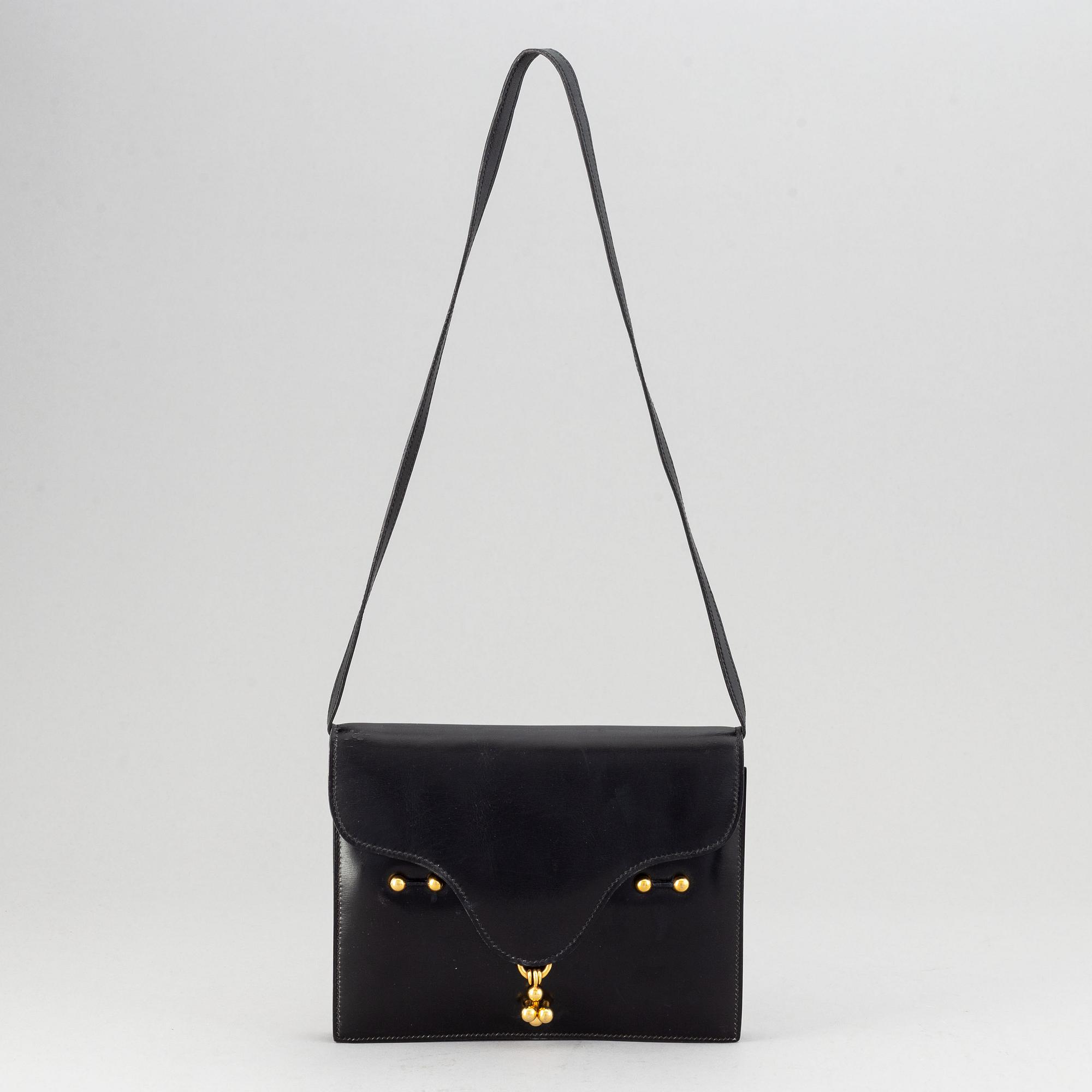 Hermès, a vintage leather bag.
