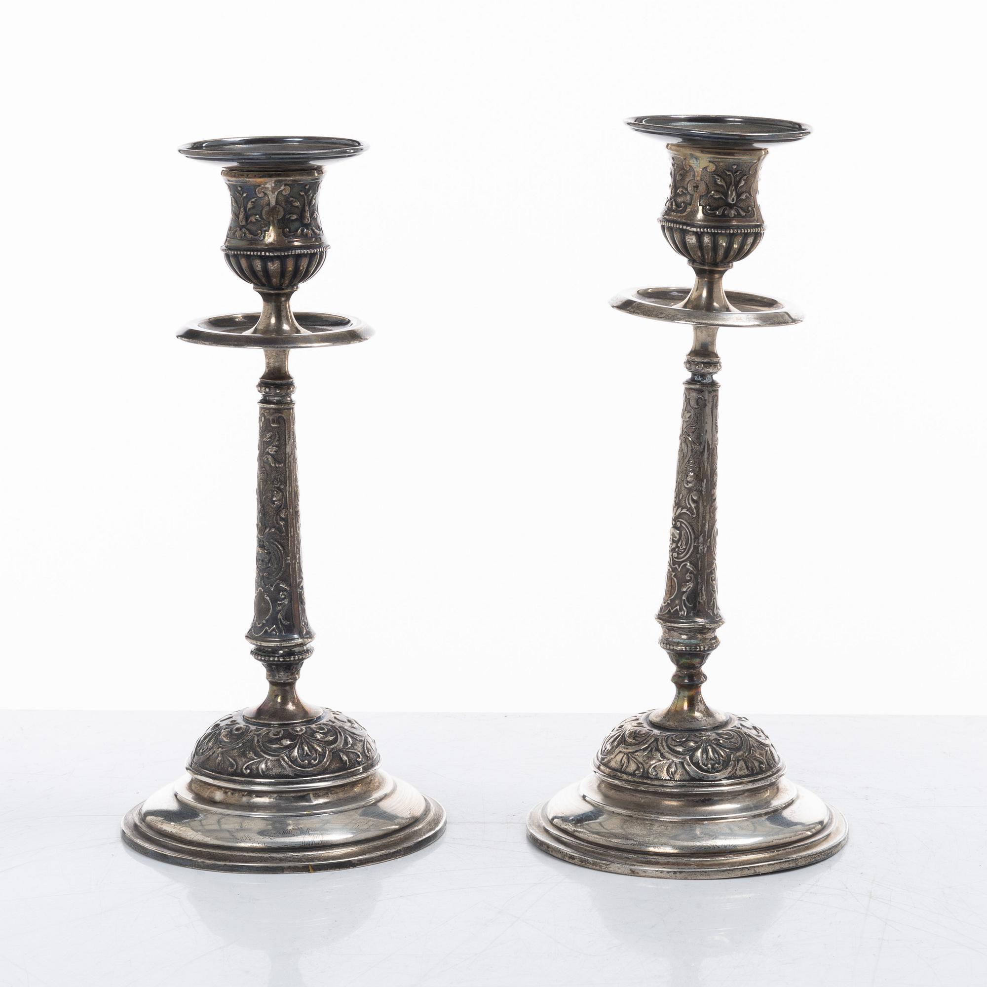 A pair of Swedish silver Renaissance-revival candlesticks, mark of CG Hallberg, Stockholm 1883.