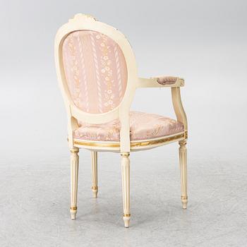 Dining table and armchair, Louis XVI style. Italy, second half of the 20th century.