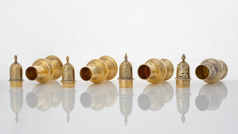 Four English 18th century silver-gilt caster-cruet, one pair marked Thomas Shepherd, 1790, one John Delmester 1760,