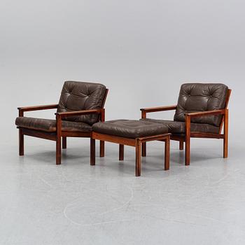 Illum Wikkelsö, a pair of 'Capella' easy chairs and one stool. Eilersen, Denmark. Designed 1959.