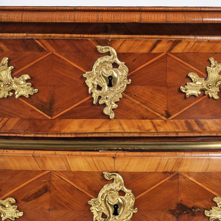 A Swedish parquetry rococo corner-commode, Stockholm later part 18th century.