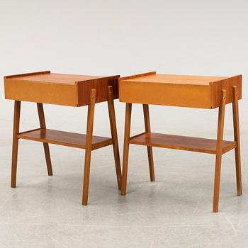 A pair of teak bedside tables, second half of the 20th Century.