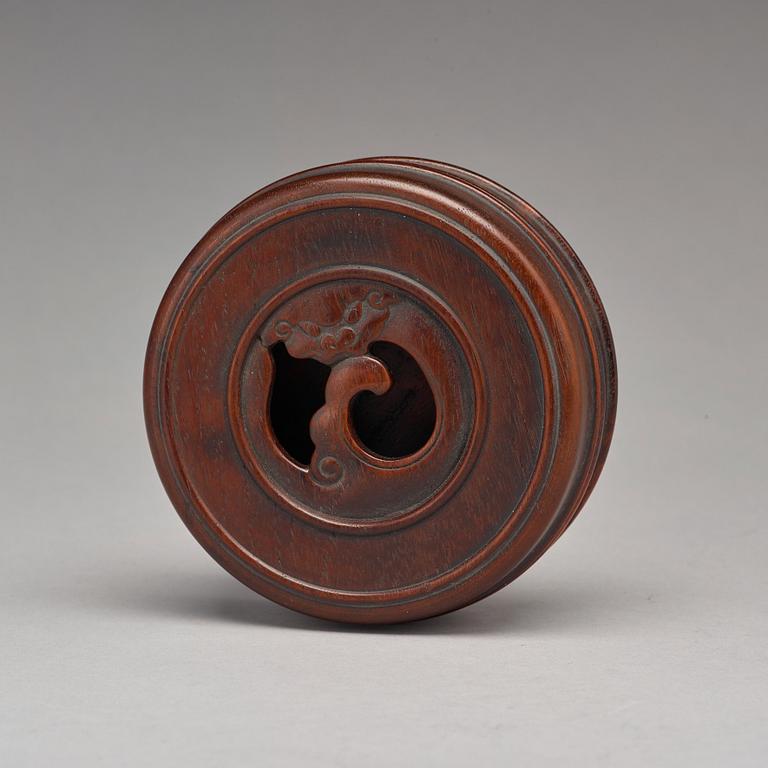 A Chinese wooden box with cover.