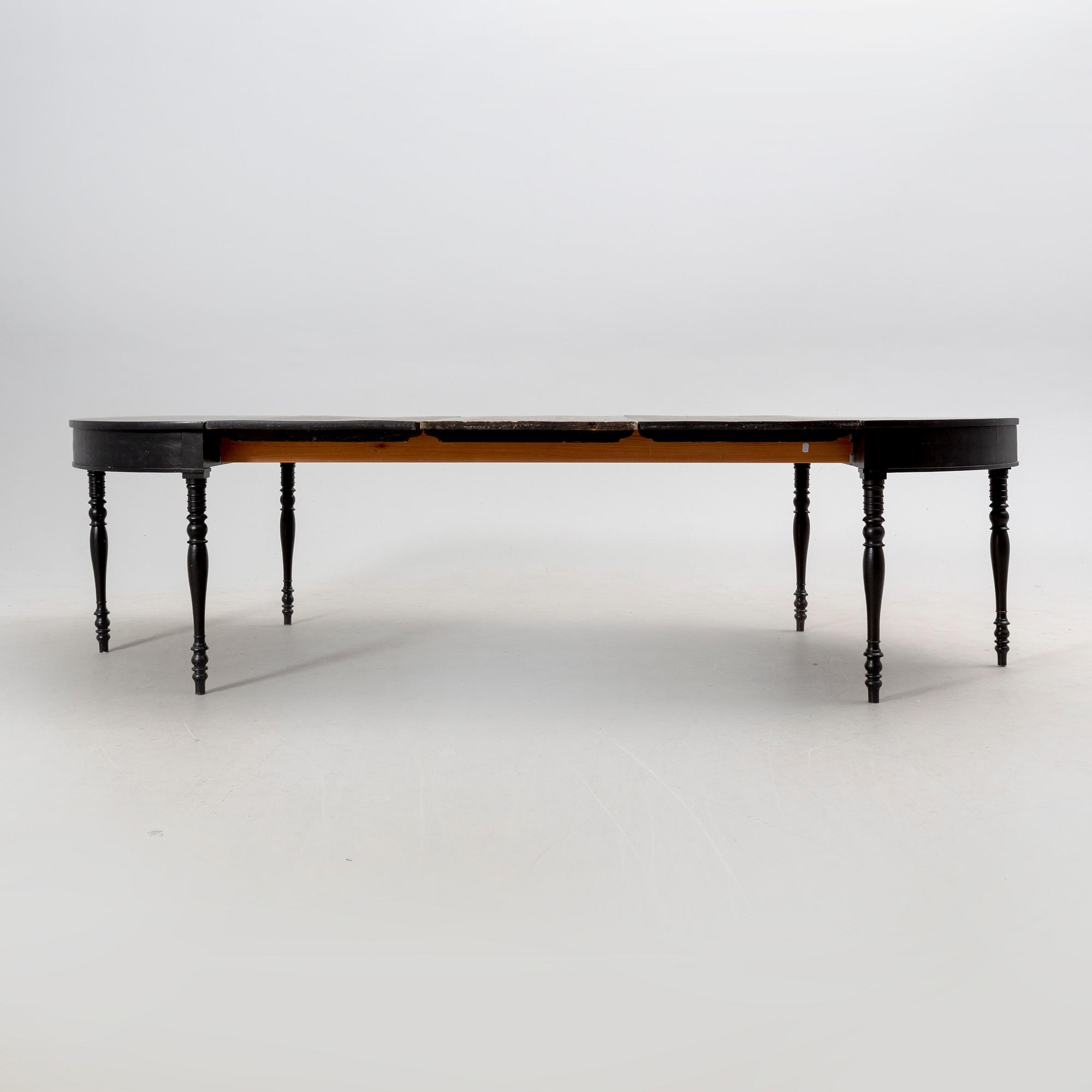 A mid 18th century painted dining table.