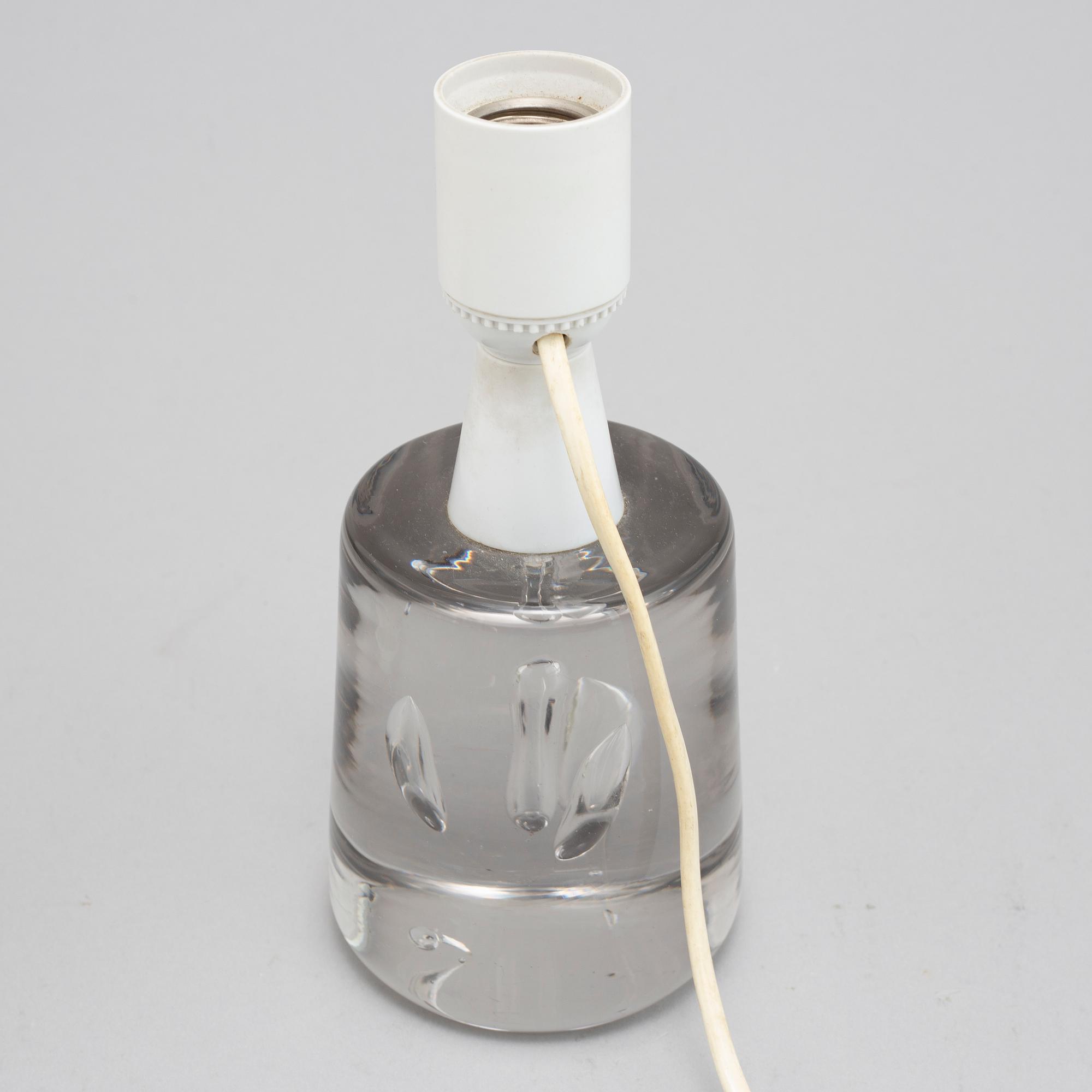 A glass table light, Reijmyre, and a letter press, second half of the 20th Century.