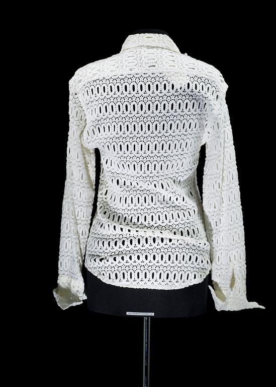 A white cottonlace shirt by Anna Sui.