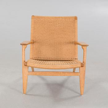 A lounge chair by Hans J Wegner, model "CH-25", for Carl Hansen & Son, Denmark, second half of the 20th century.