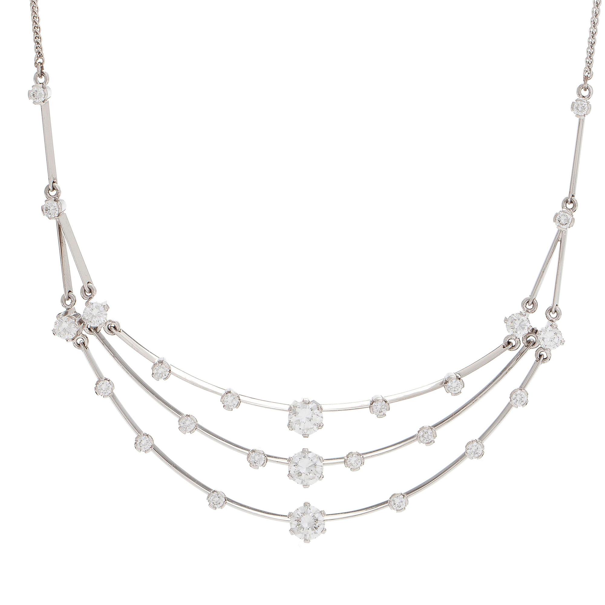 Collier, 18K vitguld med briljantslipade diamanter. A Tillander 1973.