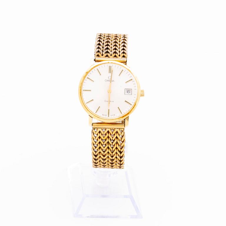 An Omega 14K gold wrist watch.