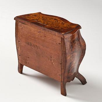 A Swedish rococo walnut parquetry miniature commode, later part 18th century.