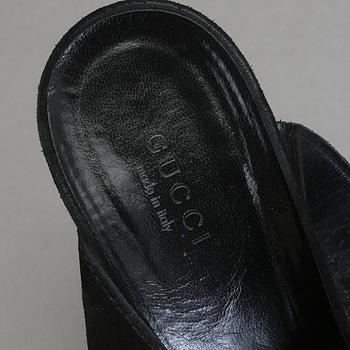 SKOR, Gucci.