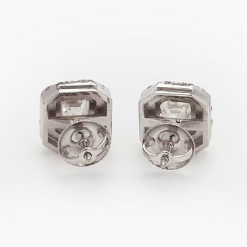 Earrings, emerald cut diamonds 0.70 ct / each and brilliant cut diamonds, 18K white gold.