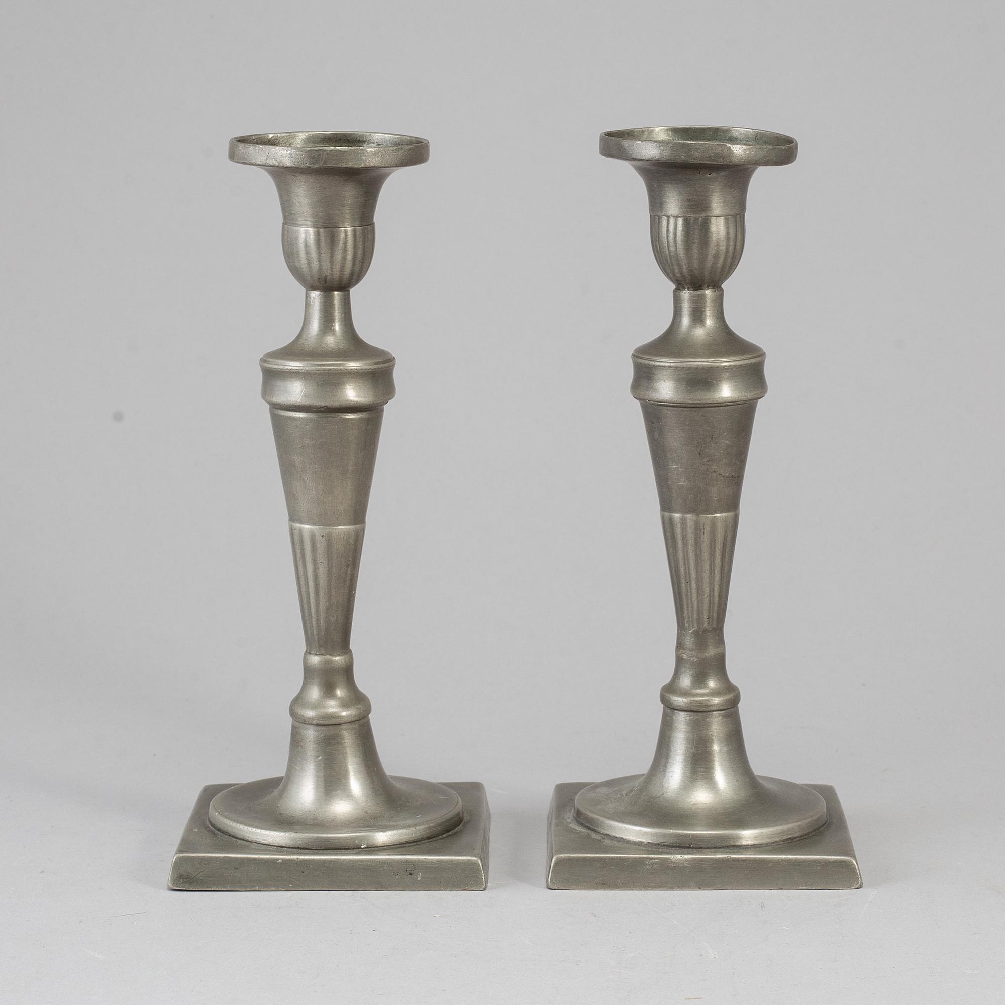A pair of 18th century pewter candlesticks.
