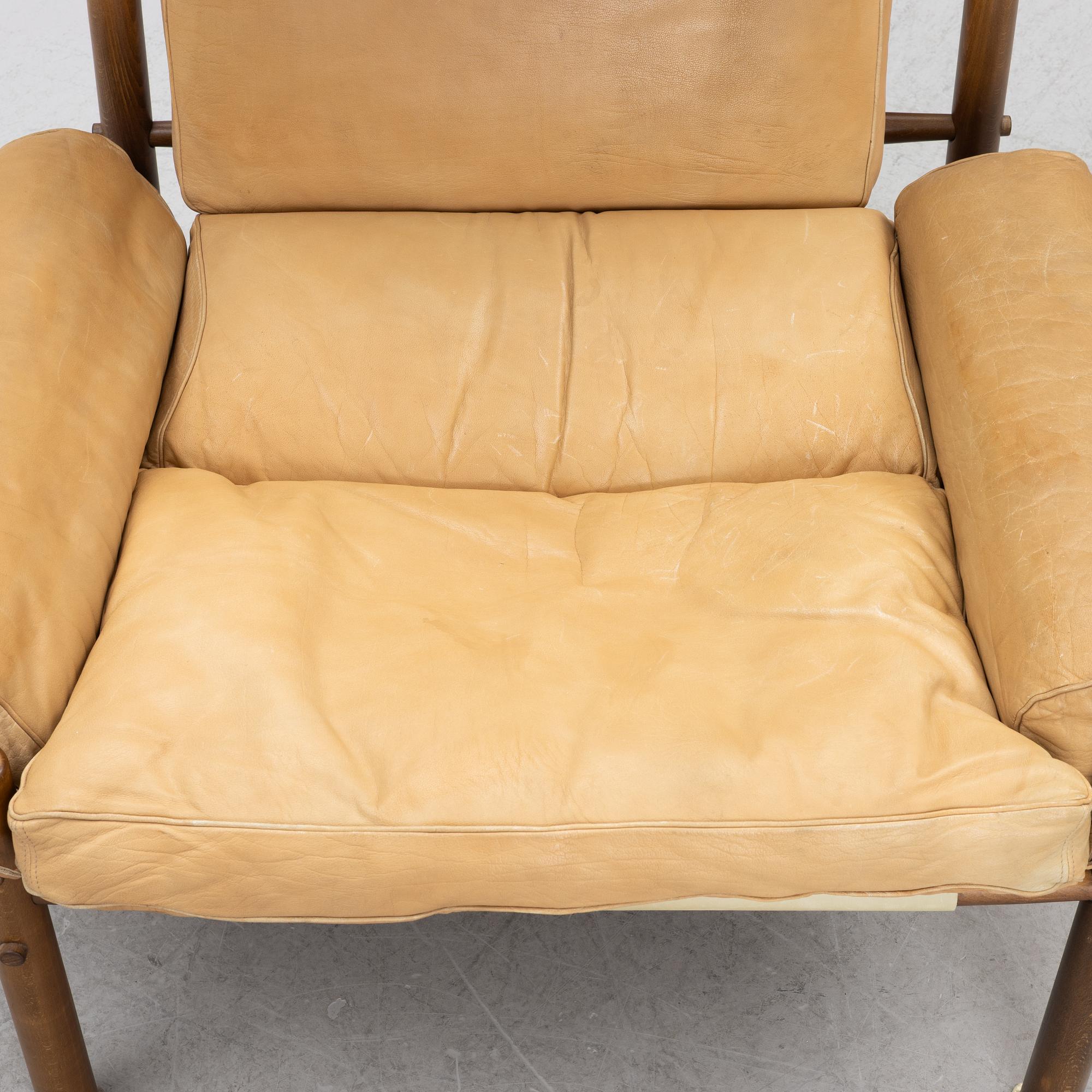 Arne Norell, Armchair with an ottoman, 'Inka', Norell Möbel AB, 1970s.