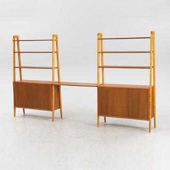 A pair of mid 20th century teak bookshelves.