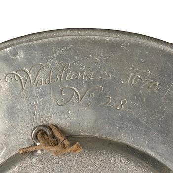 A pewter plate from Hedvig Eleonora's 'Wadstena' service, dated 1670.
