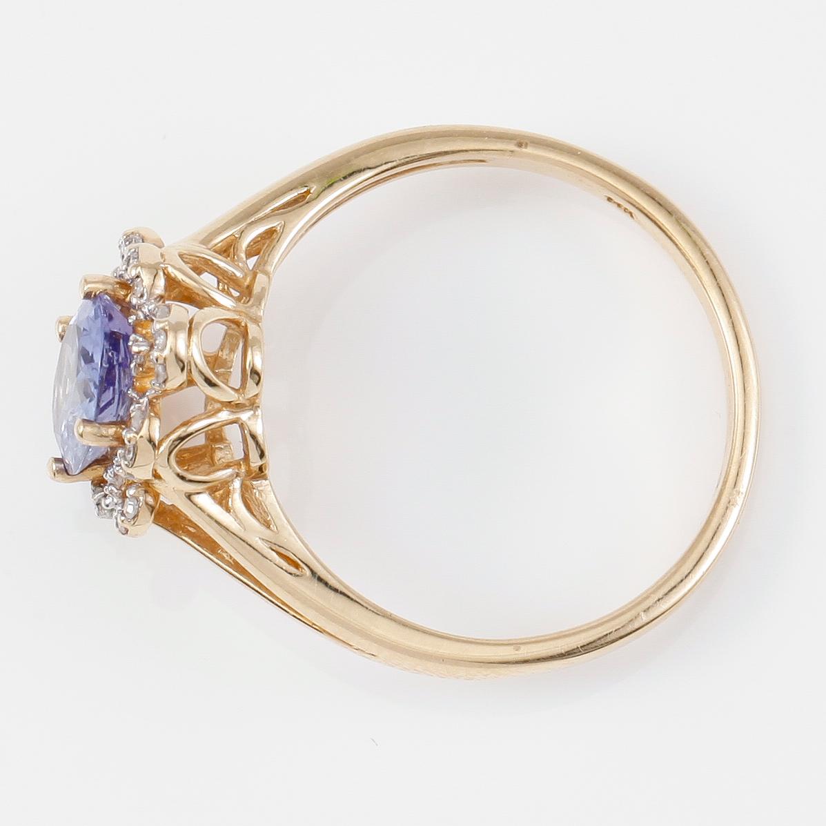 RING, 14K guld, tanzanit och mindre diamanter.