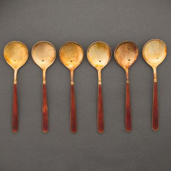 Fourteen Finnish sterling silver and red enamel spoons by Tillander, Helsinki 1950-70s.