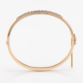 ARMBAND, 14K guld, syntetiska rubiner. Tarkkanen Oy, Helsingfors 1959.
