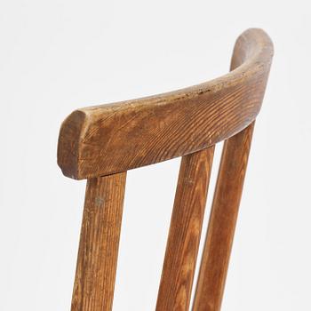 Axel Einar Hjorth, a set of seven stained pine "Utö" chairs, Nordiska Kompaniet, Sweden, 1930s.