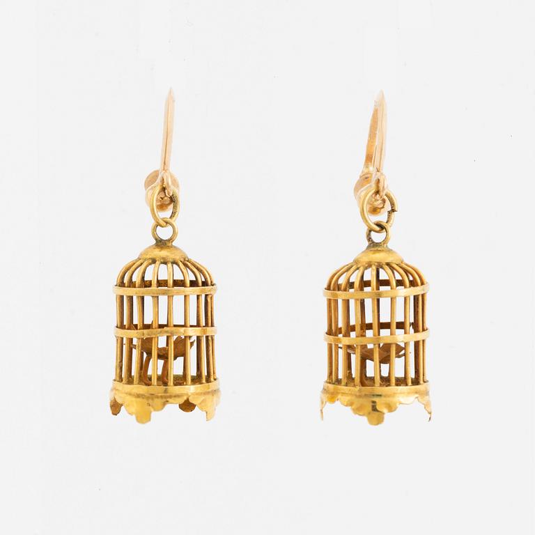 18K gold bird cage earrings.