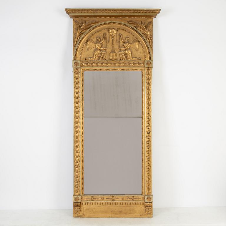 An Empire mirror, first half of the 19th Century.