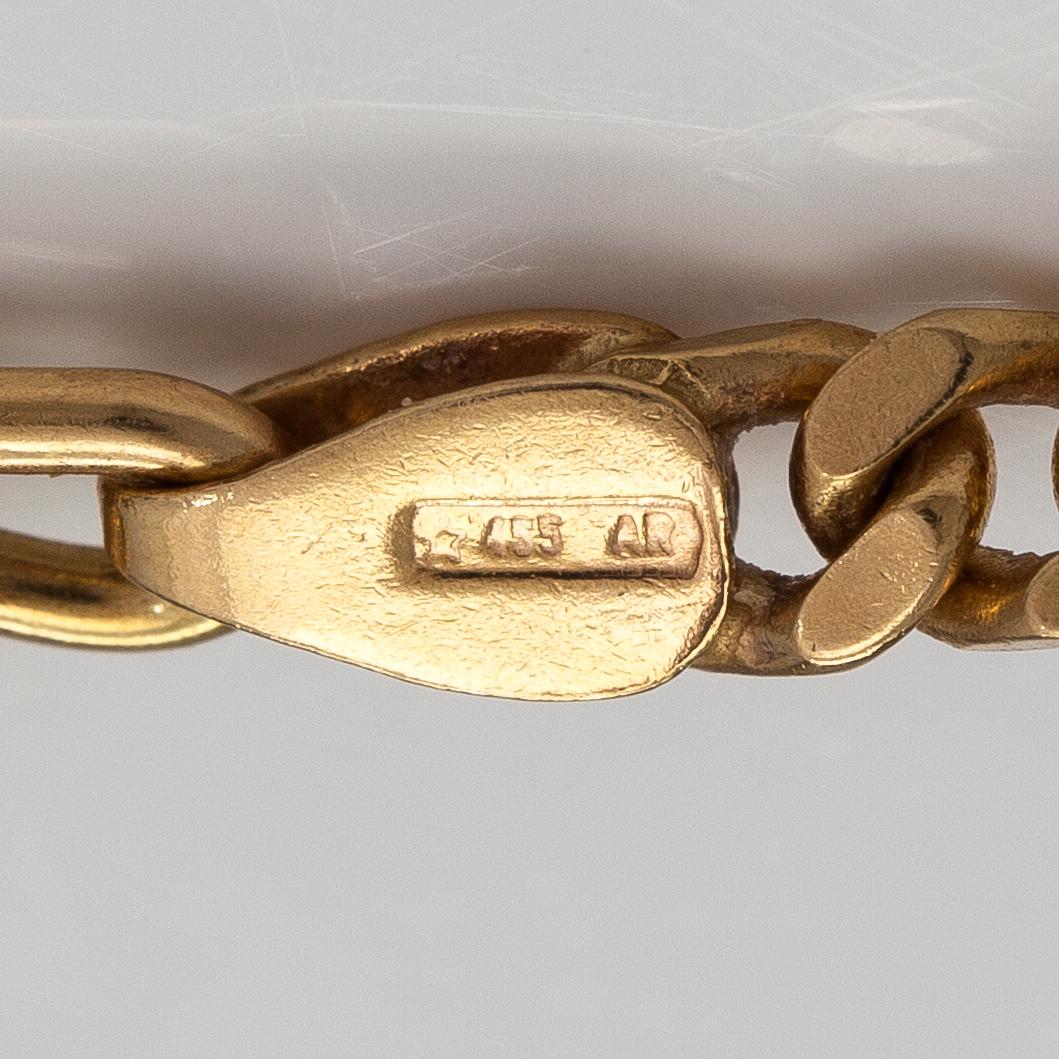 A 14K gold neckalce. Italy.
