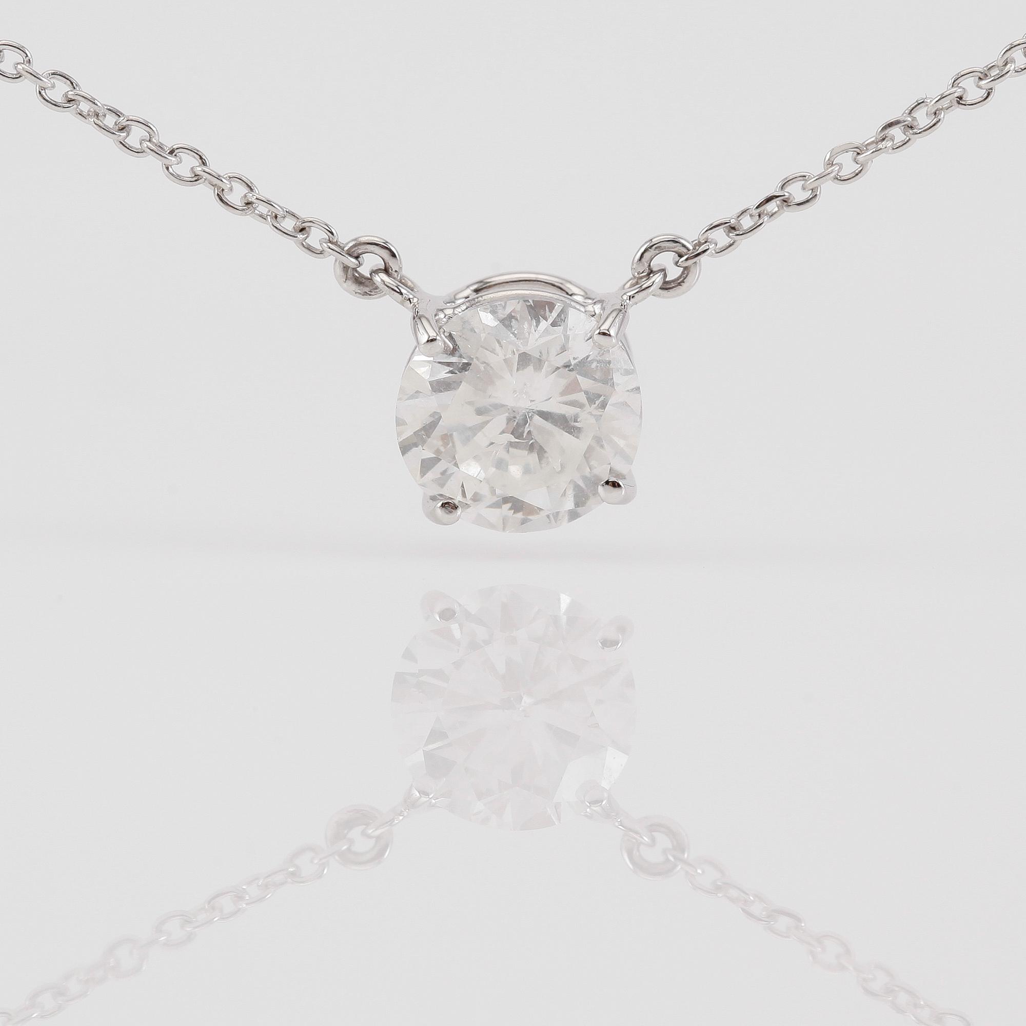 COLLIER, 18K vitguld och solitär diamant tot ca 1.50 ct.