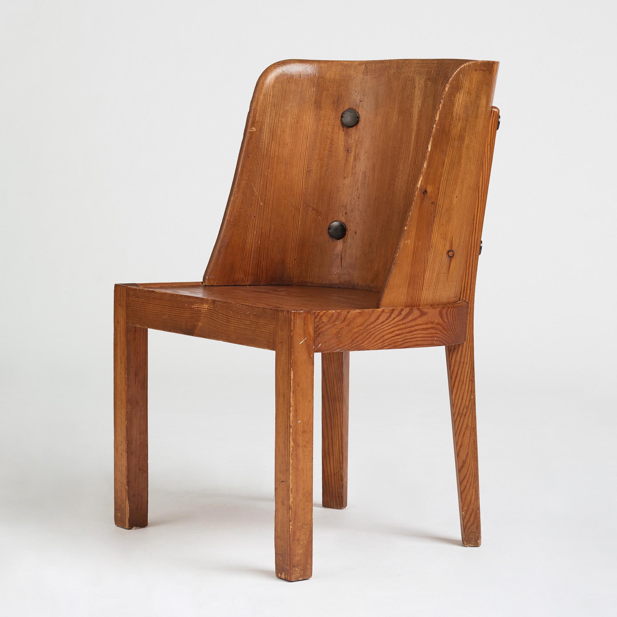 Axel Einar Hjorth, a stained pine low back "Lovö" chair, Nordiska Kompaniet, Sweden 1930's.