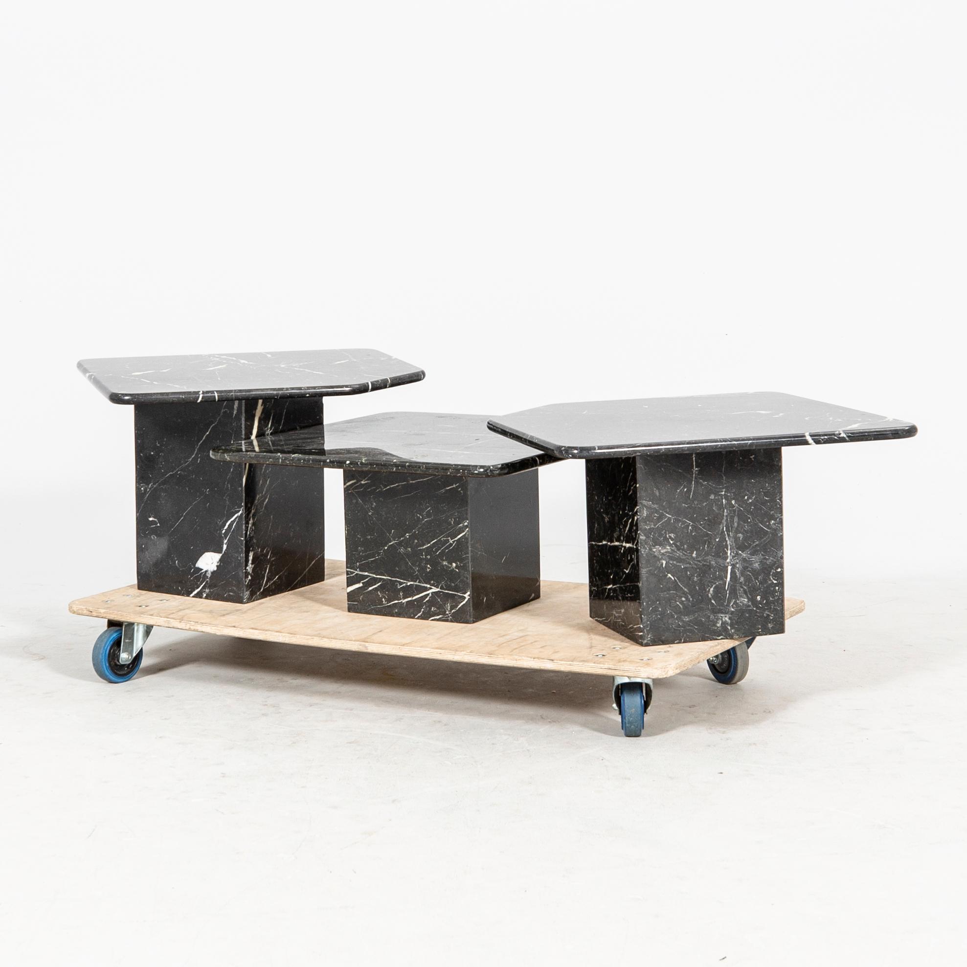 A three pcs marlbe coffee table/Nesting table.
