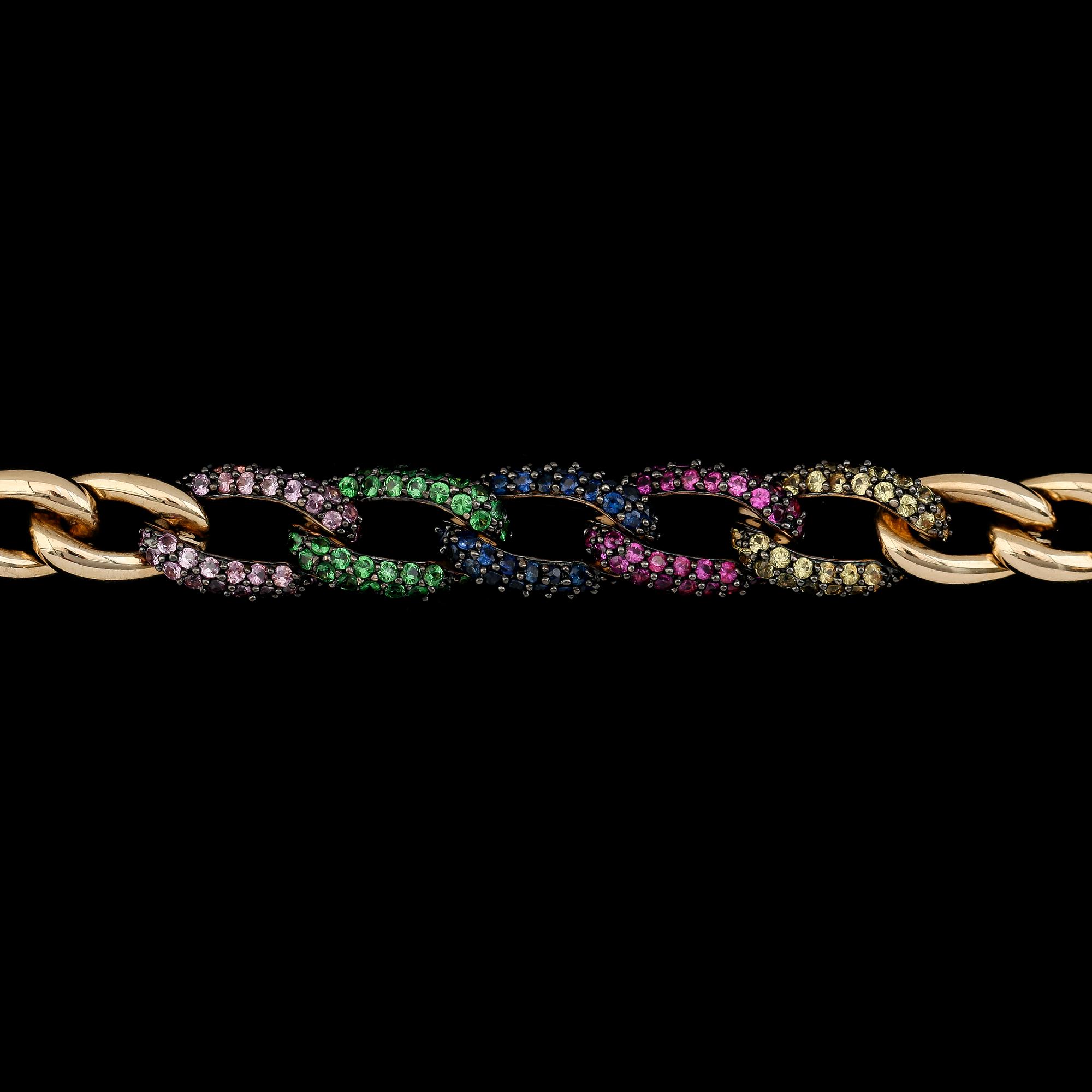 ARMBAND, 14K guld med olikfärgade safirer och tsavoriter. Total vikt ca 21 g.
