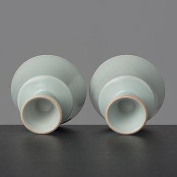 A pair of celadon glazed stemcups, China, 20th Century with Yongzheng mark.